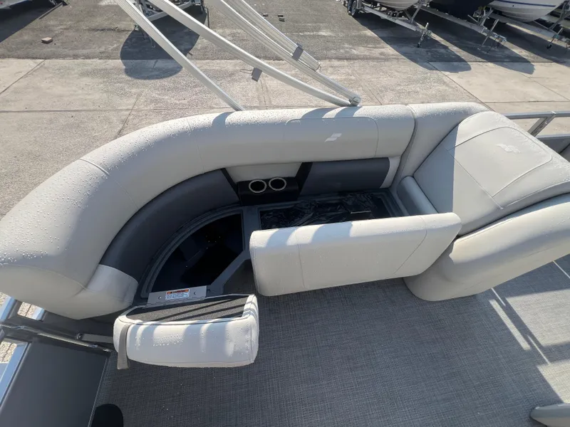 Slide: The Image of 2025 Starcraft LX 18 F boat interior with gray seating and cup holders. - 6