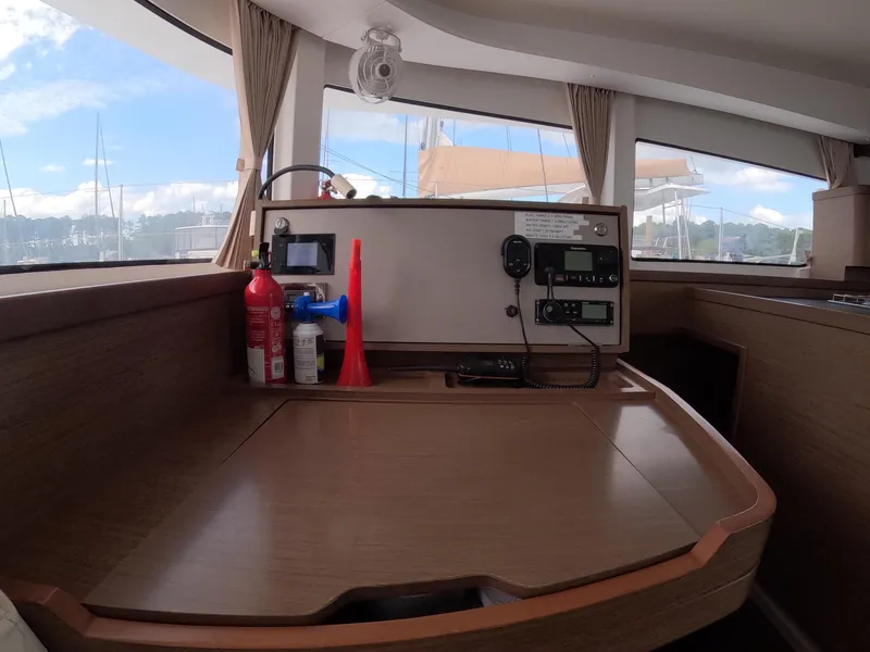 Slide: The Image of Interior of 2019 Lagoon 42 yacht with navigation station and equipment. - 27