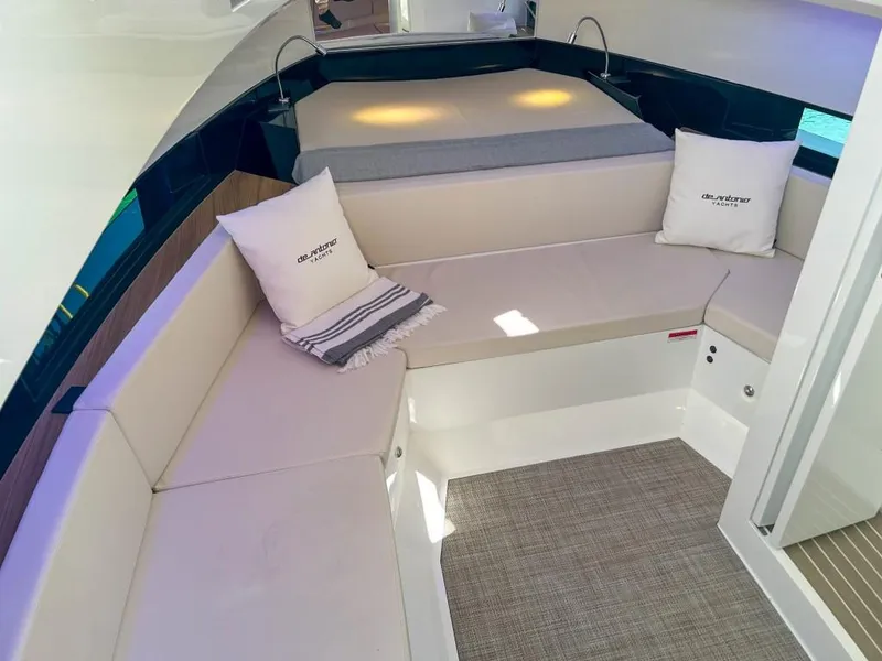 Slide: The Image of Interior of 2024 De Antonio Yachts D36 OPEN with elegant seating and cushions. - 10
