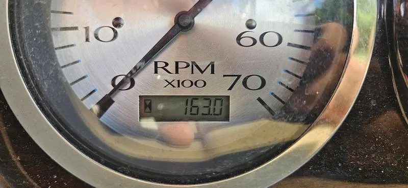 Slide: The Image of Close-up of a 2013 Bennington 2375 GCW tachometer showing 1630 RPM. - 8