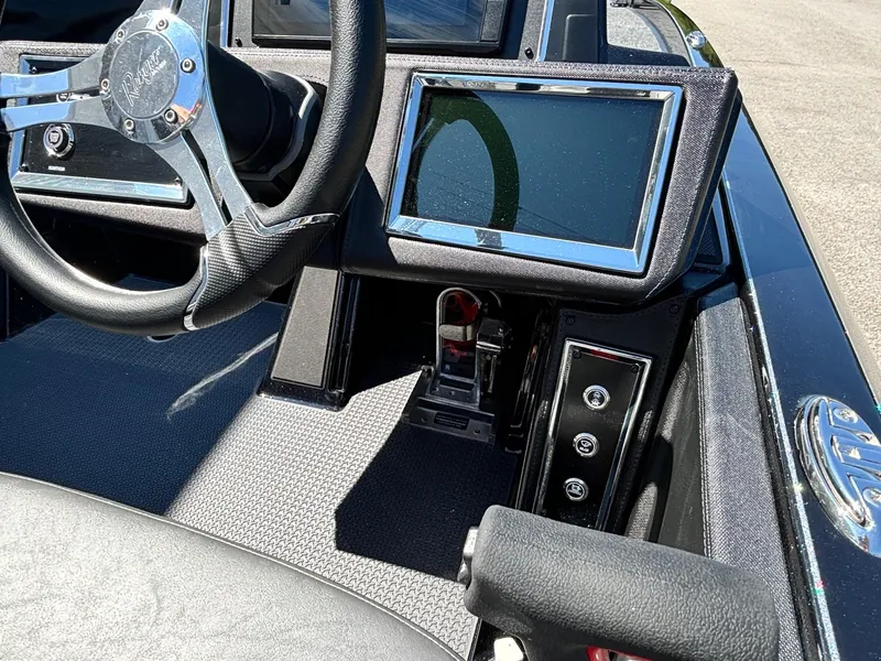 Slide: The Image of 2025 Ranger Z520R Garmin Ranger Cup boat dashboard with steering wheel and touchscreen display. - 12