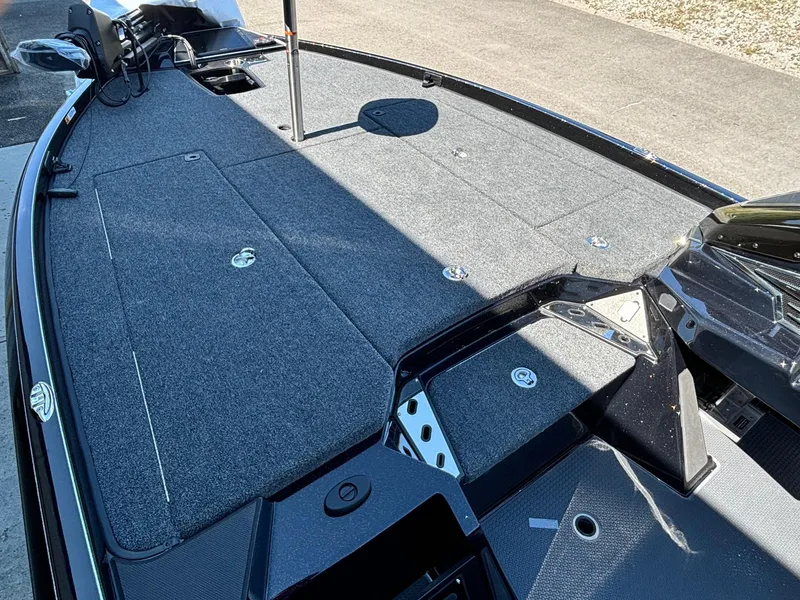 Slide: The Image of 2025 Ranger Z520R Garmin Ranger Cup boat deck with storage compartments and sleek design. - 5