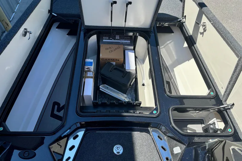 Slide: The Image of 2025 Ranger Z520R Garmin Ranger Cup boat storage compartments with equipment and accessories. - 8