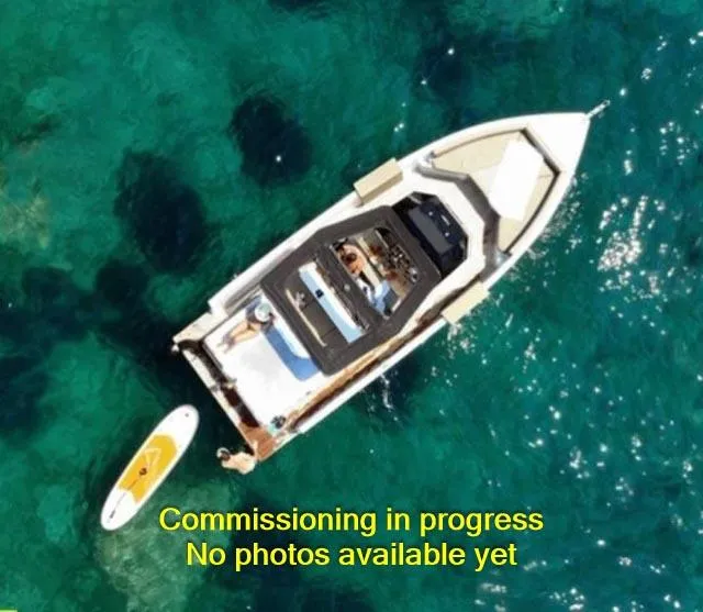 Slide: The Image of Aerial view of 2024 De Antonio Yachts D28 Open on clear blue water. - 9