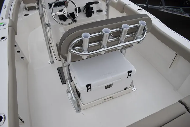 Slide: The Image of 2024 Key West 203 FS boat interior with rod holders and cooler. - 11