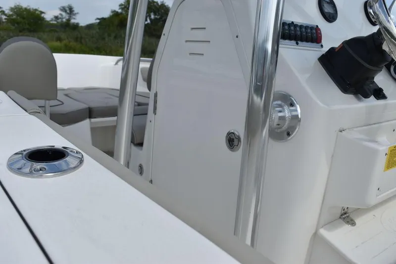 Slide: The Image of 2024 Key West 203 FS boat interior with console and seating. - 13