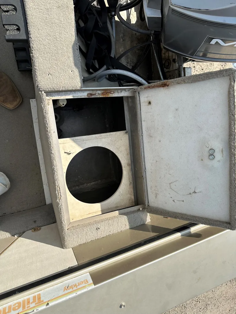 Slide: The Image of Open storage compartment on a 1994 Lund 1850 Tyee boat. - 8