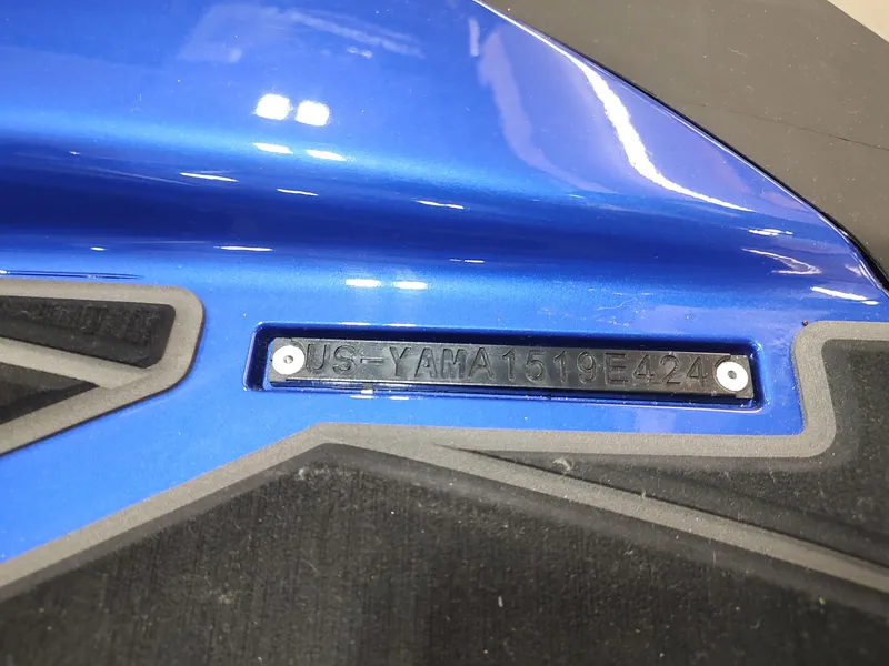 Slide: The Image of 2024 Yamaha WaveRunner GP SVHO hull identification number on blue surface. - 13