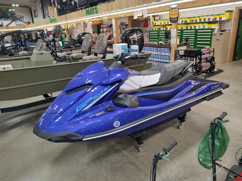 Slide: The Image of 2024 Yamaha WaveRunner GP SVHO in showroom, blue color, sleek design, high-performance watercraft. - 8