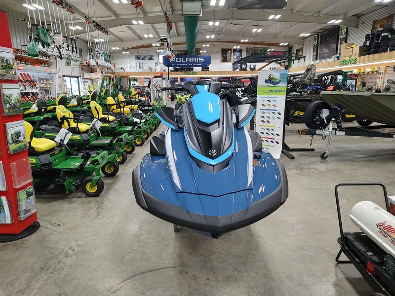 Slide: The Image of 2024 Yamaha WaveRunner FX Cruiser HO displayed in a showroom with various equipment. - 1