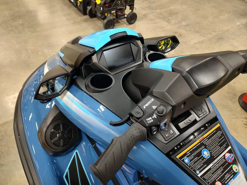 Slide: The Image of 2024 Yamaha WaveRunner FX Cruiser HO dashboard with controls and display, in a showroom setting. - 13