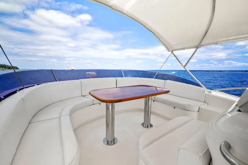 Slide: The Image of Luxurious 2008 Mochi Craft Dolphin yacht with elegant seating and ocean view. - 28