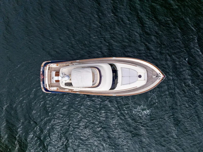 Slide: The Image of Aerial view of 2008 Mochi Craft Dolphin yacht on open water. - 8
