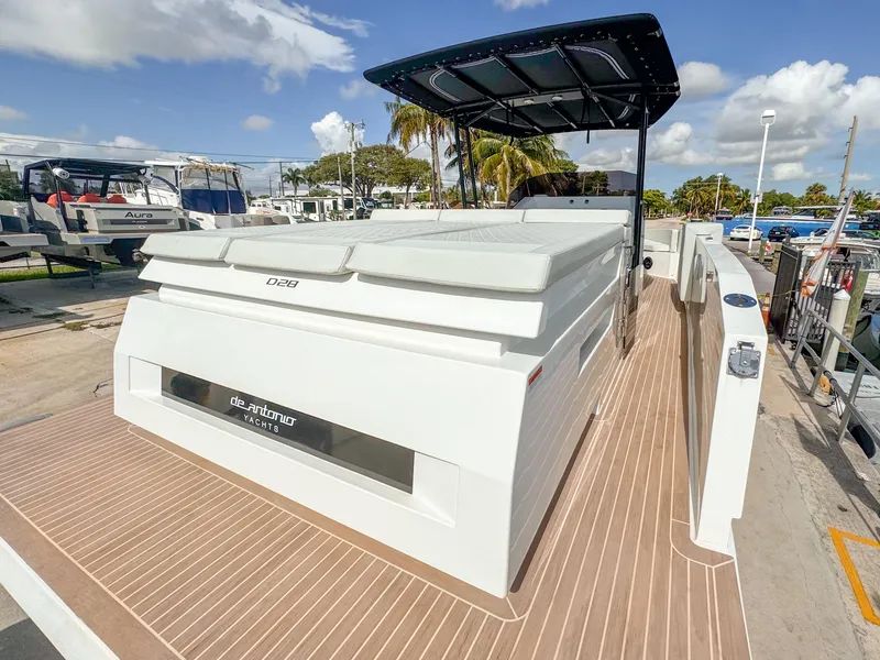 Slide: The Image of 2024 De Antonio Yachts D28 Open, docked with sleek design and spacious deck. - 5