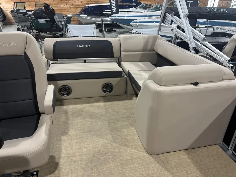 Slide: The Image of 2025 Harris CRUISER 230 SL interior with beige seating and black accents. - 5