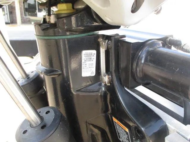 Slide: The Image of Close-up of 2023 Caymas 26HB boat engine components. - 6