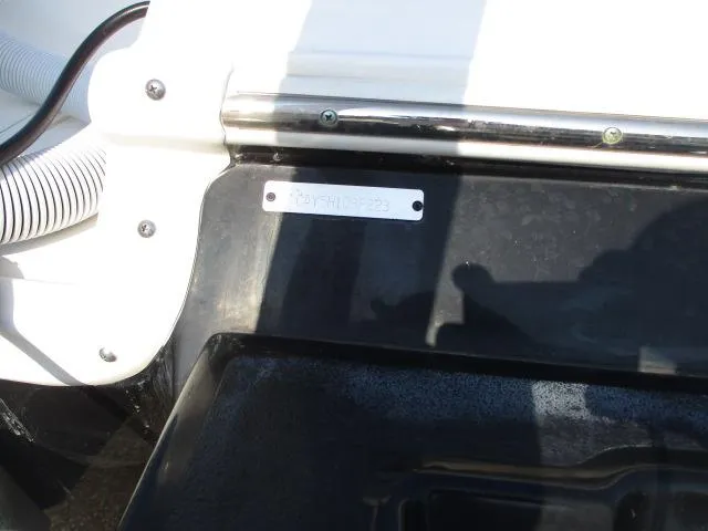 Slide: The Image of 2023 Caymas 26HB boat detail with identification plate. - 7