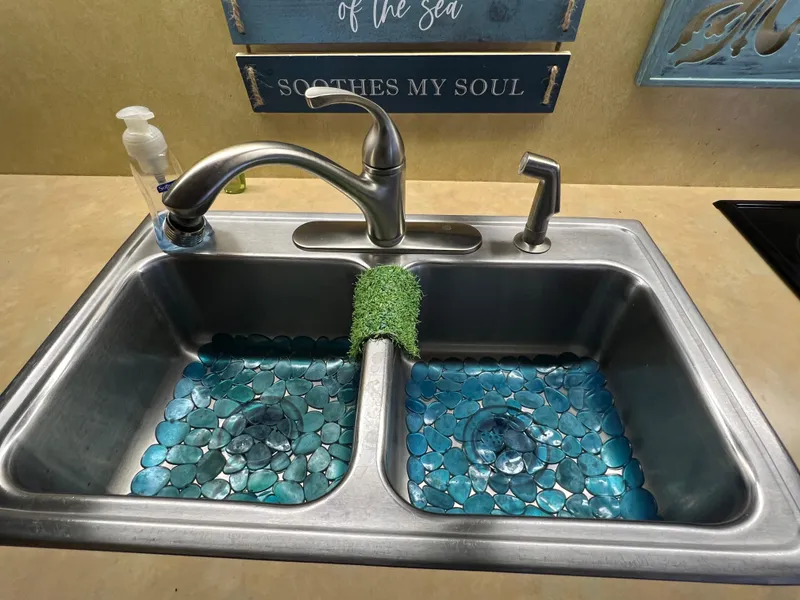 Slide: The Image of Stainless steel sink with blue glass pebbles, Bertram 42 Motor Yacht, 1977. - 19