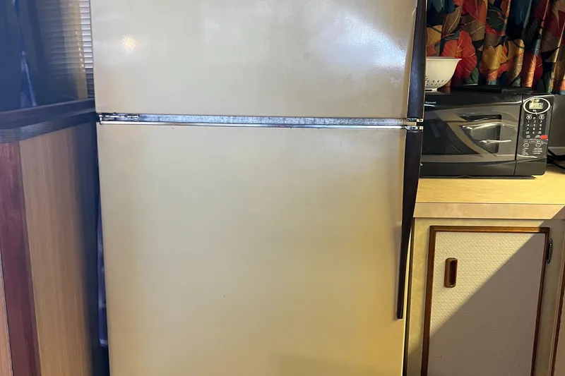 Slide: The Image of Vintage refrigerator in a 1977 Bertram 42 Motor Yacht kitchen. - 21