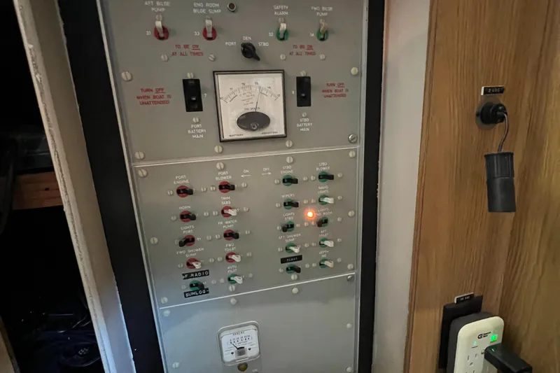Slide: The Image of Electrical control panel on a 1977 Bertram 42 Motor Yacht. - 33