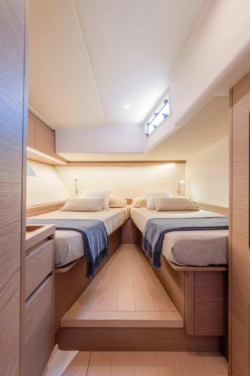 Slide: The Image of Luxurious cabin interior of 2025 Grand Soleil 52 Performance yacht with twin beds. - 24