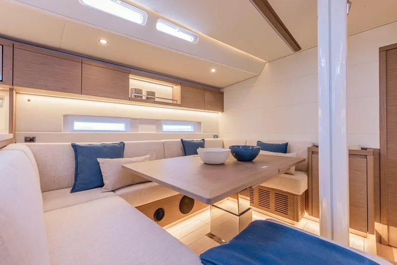 Slide: The Image of Luxurious interior of 2025 Grand Soleil 52 Performance yacht with modern seating and decor. - 28
