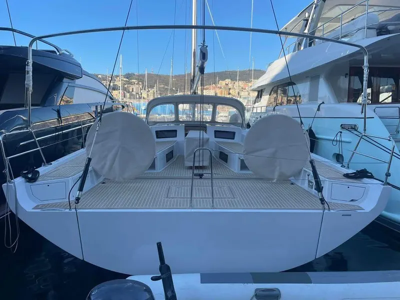 Slide: The Image of Grand Soleil 52 Performance 2025 yacht docked at marina, rear view. - 38