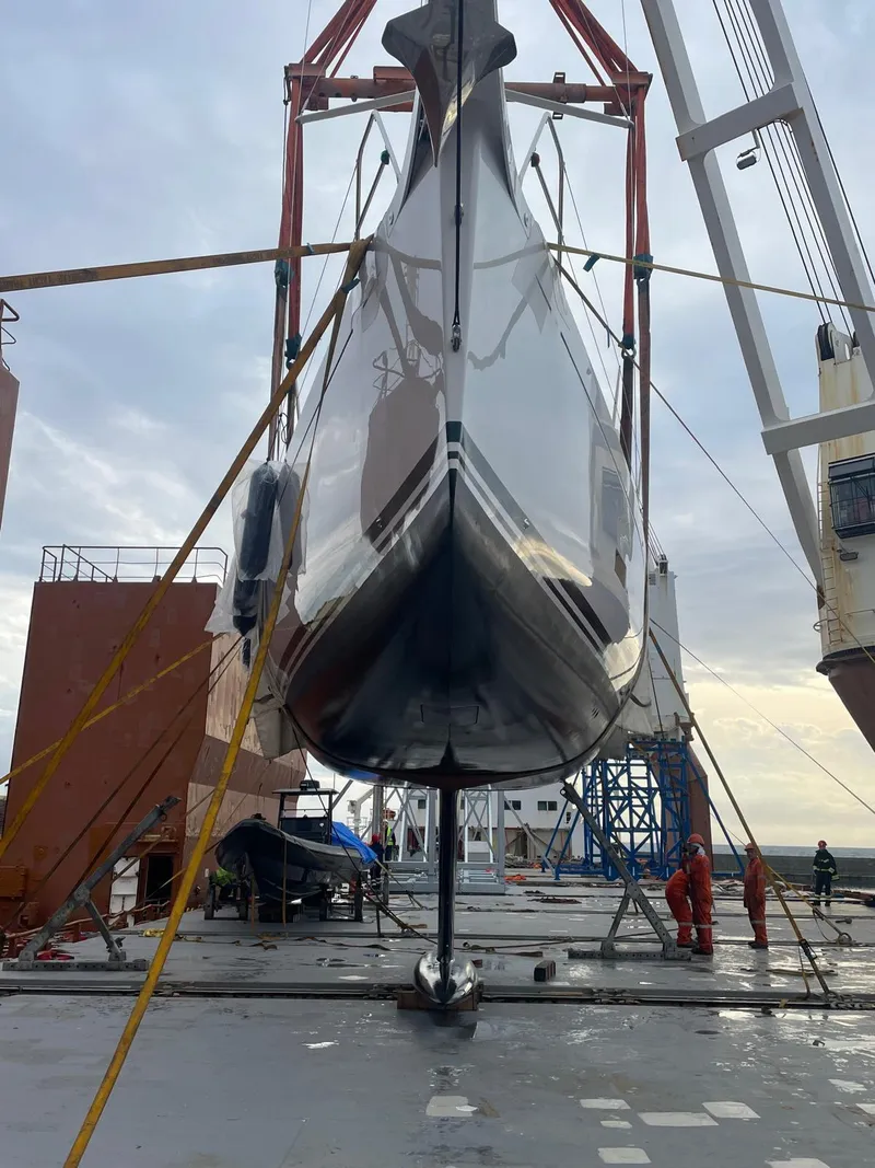 Slide: The Image of 2025 Grand Soleil 52 Performance yacht in shipyard, suspended for maintenance. - 43