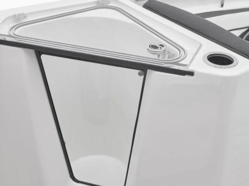 Slide: The Image of 2024 Yamaha Boats 252 FSH Sport storage compartment detail, featuring sleek design and functionality. - 5