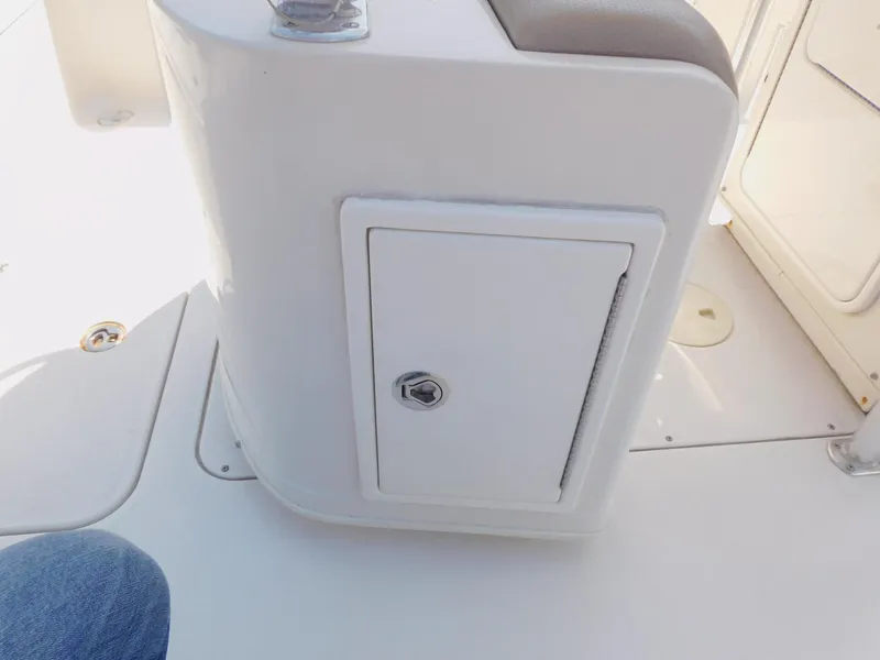Slide: The Image of 2009 Ranger 2200 Bay Ranger boat storage compartment with lockable door. - 21