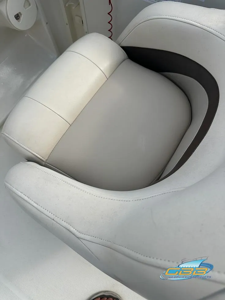 Slide: The Image of 2007 SouthWind 210 SD boat seat, white and gray upholstery, close-up view. - 15