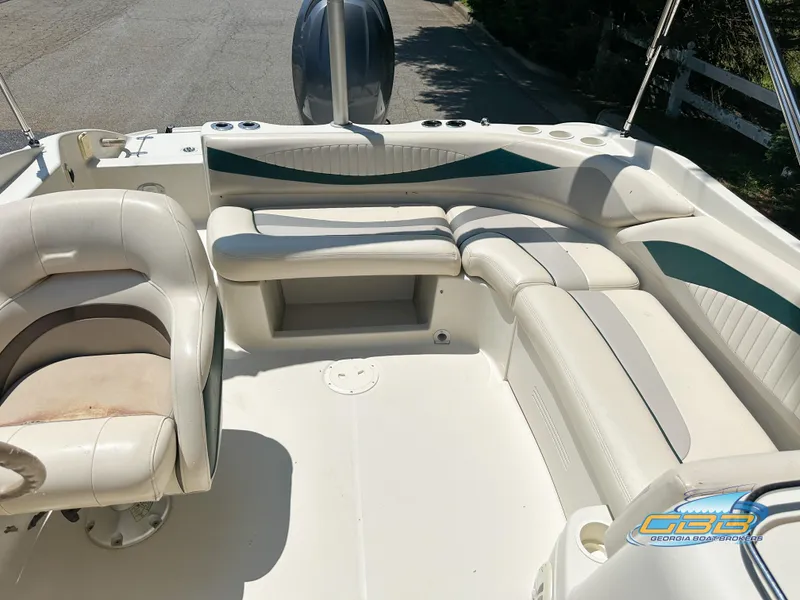 Slide: The Image of 2007 SouthWind 210 SD boat interior with white seating and steering console. - 21