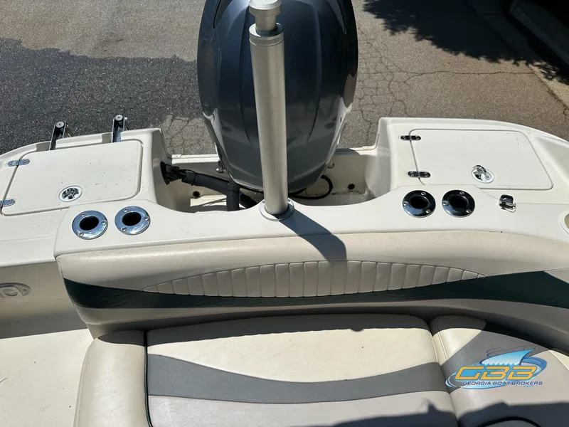 Slide: The Image of 2007 SouthWind 210 SD boat interior with motor and seating area. - 22