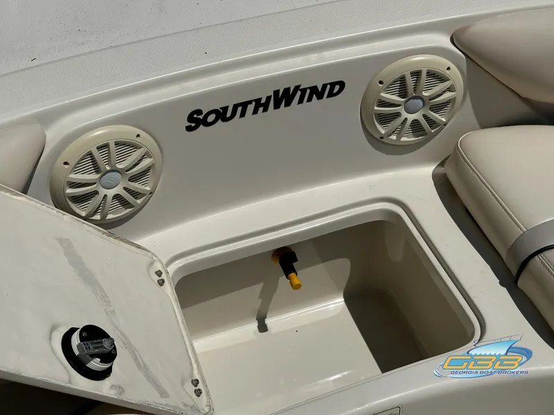 Slide: The Image of 2007 SouthWind 210 SD boat interior with storage compartment and speakers. - 25