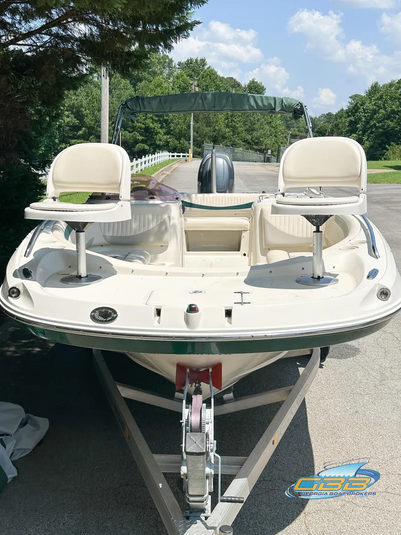 Slide: The Image of 2007 SouthWind 210 SD boat on trailer, outdoor setting, sunny day. - 8