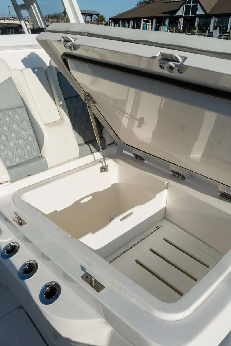 Slide: The Image of 2025 Invincible 36 Open Fisherman boat with open storage compartment. - 34