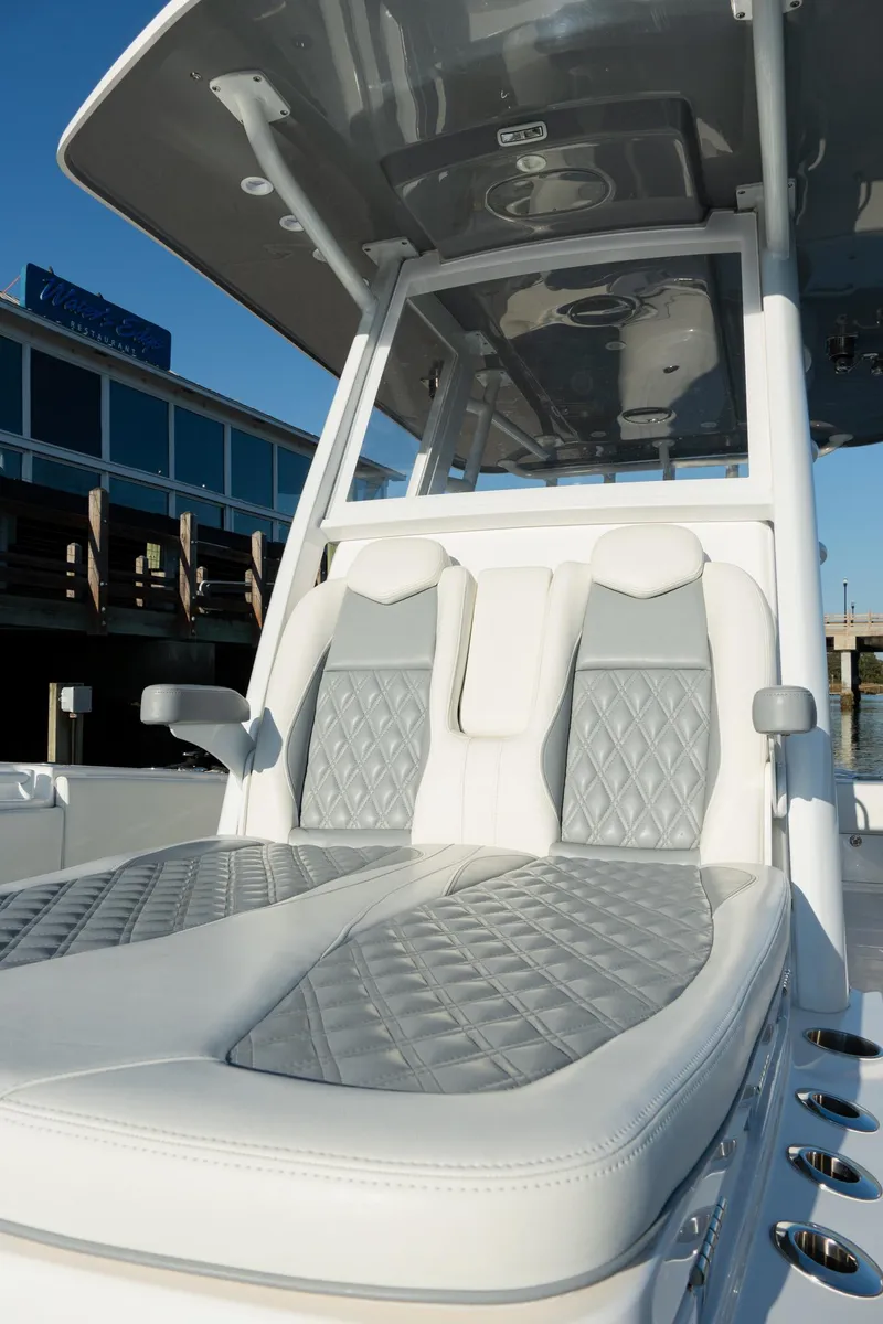 Slide: The Image of 2025 Invincible 36 Open Fisherman boat with luxurious seating and modern design. - 6