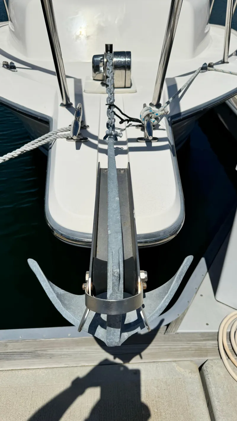 Slide: The Image of 2014 Defiance Guadalupe 290 EX boat anchor at dock. - 14