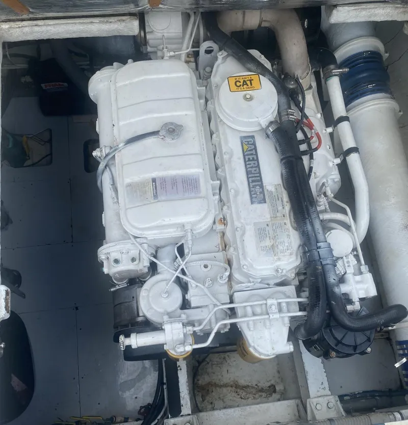 Slide: The Image of Engine compartment of a 1986 Midnight Lace 52 Flybridge yacht with Caterpillar engine. - 30