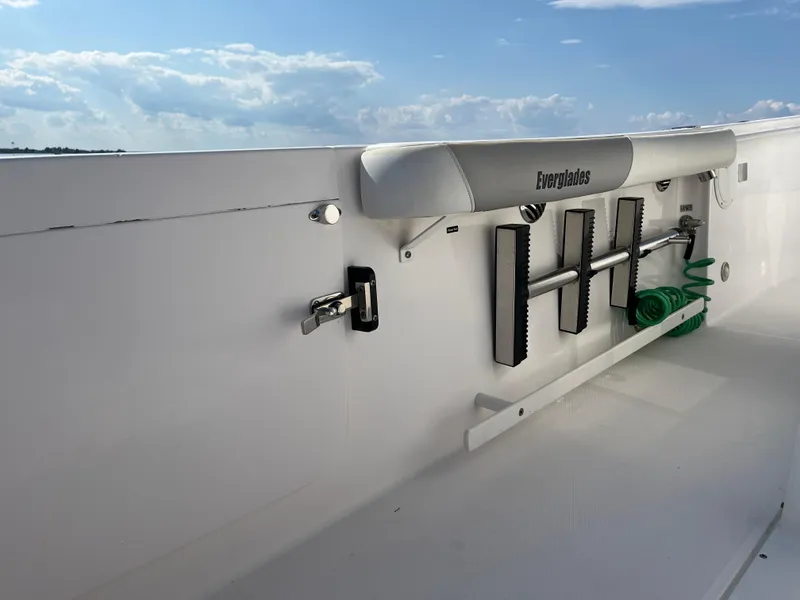 Slide: The Image of 2013 Everglades 295 Center Console boat deck with storage and equipment. - 19
