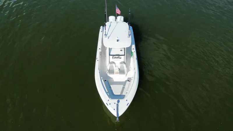 Slide: The Image of 2013 Everglades 295 Center Console boat on calm water, aerial view. - 8