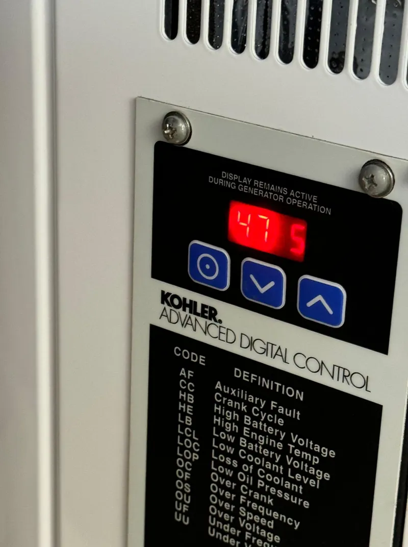 Slide: The Image of Kohler advanced digital control panel on 2013 Carver 54 Voyager yacht. - 48