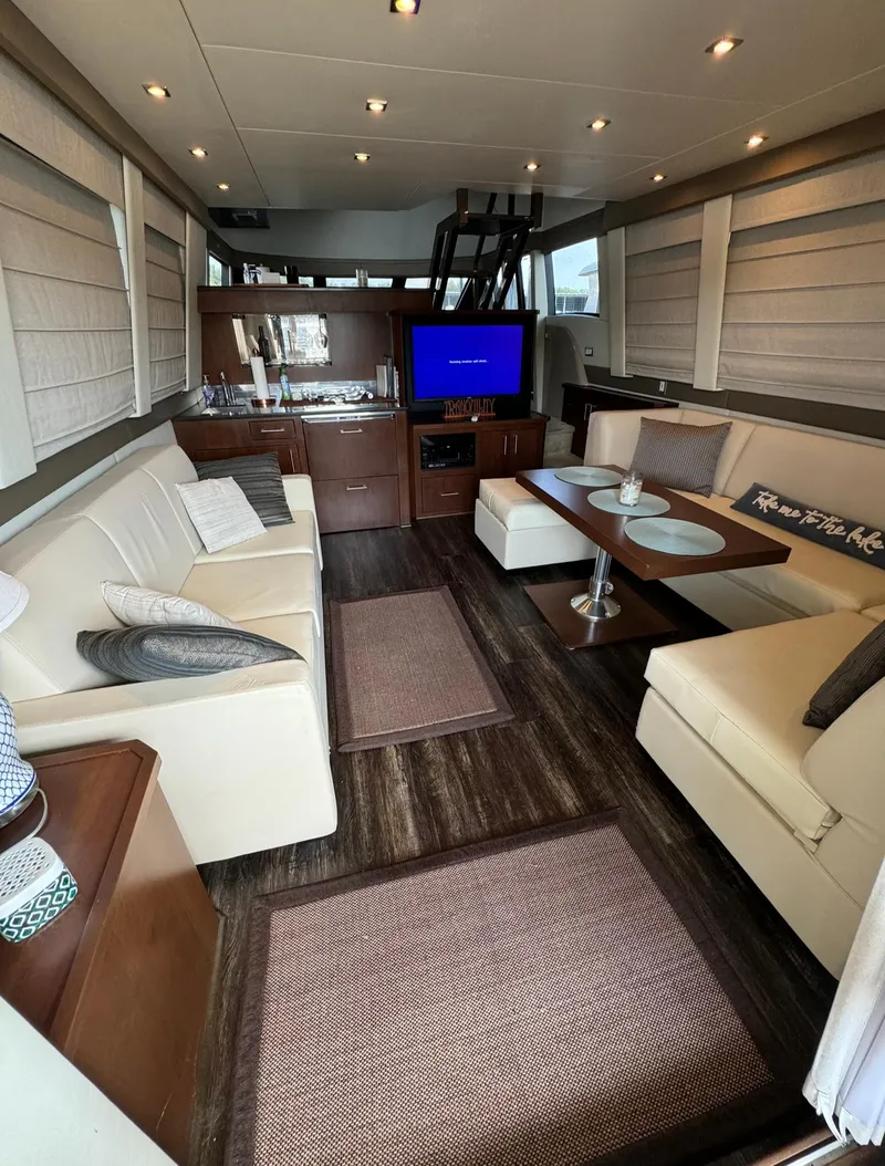 Slide: The Image of Luxurious interior of a 2013 Carver 54 Voyager yacht with modern furnishings. - 9