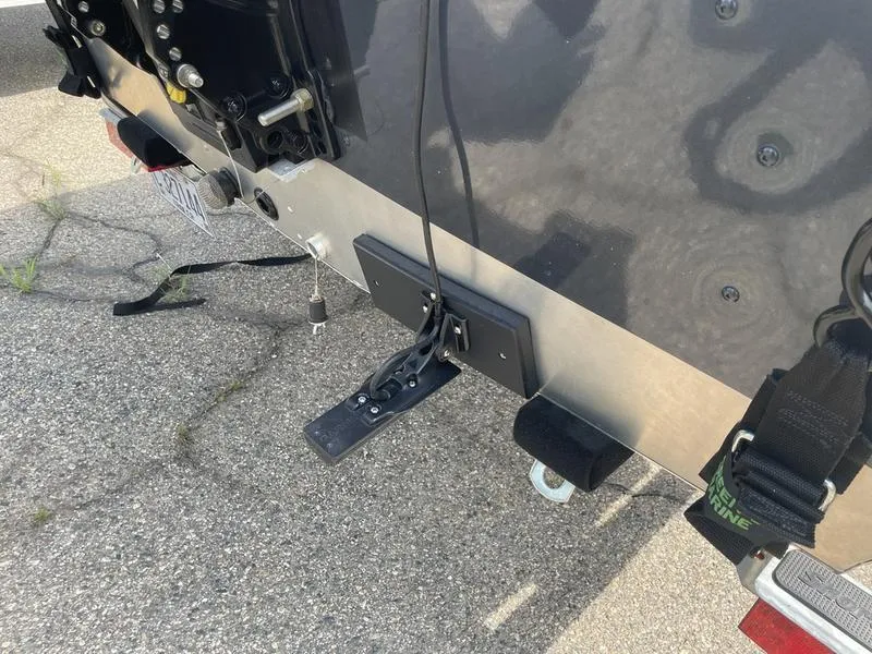 Slide: The Image of 2023 Lund 1600 Fury boat trailer hitch and accessories on pavement. - 1