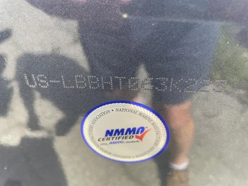 Slide: The Image of 2023 Lund 1600 Fury with NMMA certification sticker and serial number. - 13