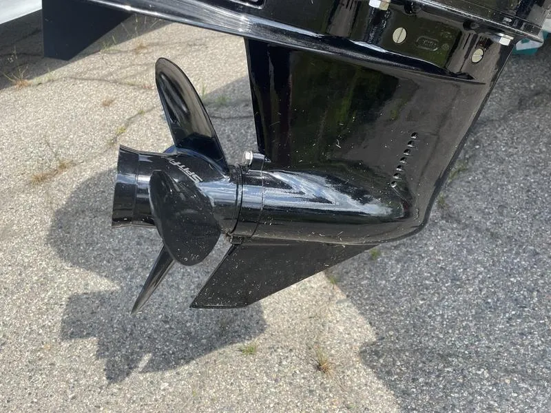 Slide: The Image of Close-up of 2023 Lund 1600 Fury boat propeller on pavement. - 15