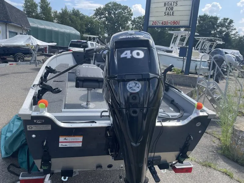 Slide: The Image of 2023 Lund 1600 Fury boat with Mercury 40 engine, displayed for sale. - 4