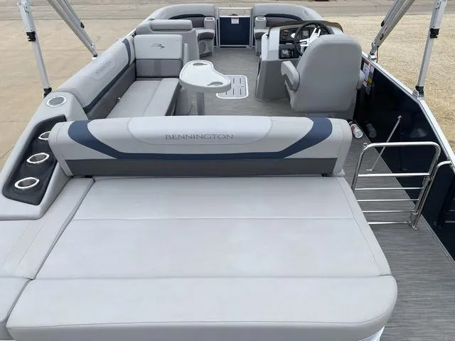 Slide: The Image of 2022 Bennington 22 SSBX pontoon boat interior with spacious seating and helm. - 10