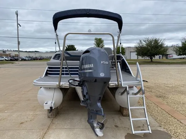 Slide: The Image of 2022 Bennington 22 SSBX pontoon boat with Yamaha 150 outboard motor. - 5