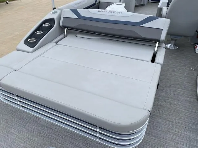 Slide: The Image of 2022 Bennington 22 SSBX boat with spacious seating and cup holders. - 8